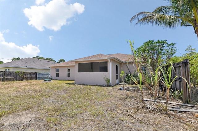 497 Lafayette St SW, Palm Bay, FL 32908 - back of property with stucco siding