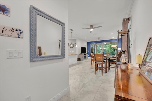 3149 Songbird Cir, Harmony, FL 34773 - dining room featuring ceiling fan and baseboards