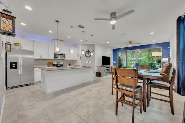 3149 Songbird Cir, Harmony, FL 34773 - dining area with ceiling fan, recessed lighting, and light tile patterned flooring