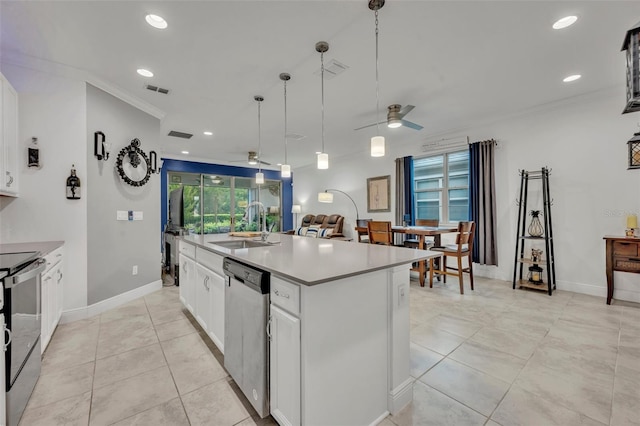 3149 Songbird Cir, Harmony, FL 34773 - kitchen featuring stainless steel dishwasher, a sink, ceiling fan, white cabinets, and an island with sink