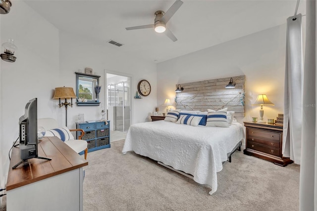 3149 Songbird Cir, Harmony, FL 34773 - bedroom with carpet floors, ceiling fan, and ensuite bath