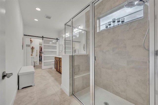 3149 Songbird Cir, Harmony, FL 34773 - full bath featuring a shower stall, vanity, a spacious closet, recessed lighting, and baseboards