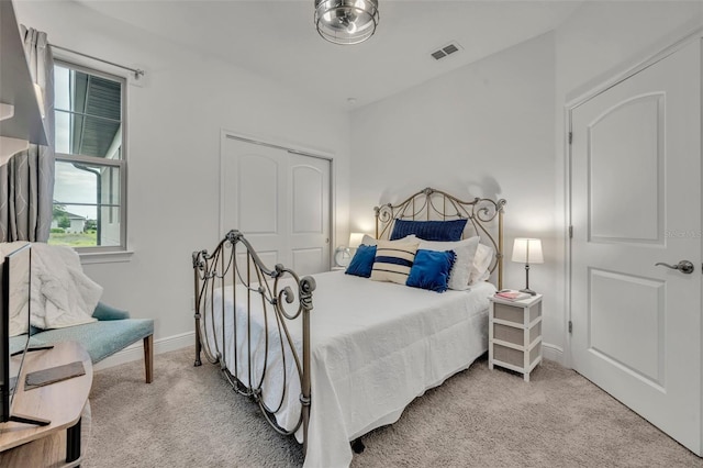 3149 Songbird Cir, Harmony, FL 34773 - bedroom with carpet flooring, baseboards, and a closet
