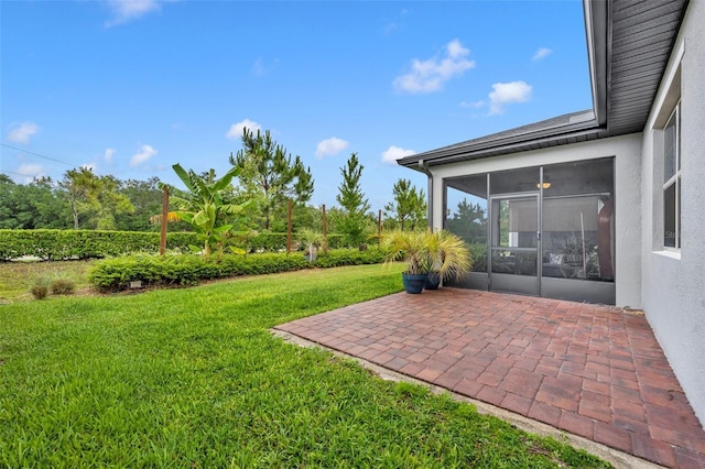 3149 Songbird Cir, Harmony, FL 34773 - view of grassy yard with a sunroom and a patio area