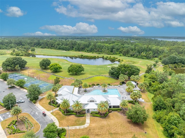 3149 Songbird Cir, Harmony, FL 34773 - bird's eye view of a nearby body of water, a golf course, and a pool