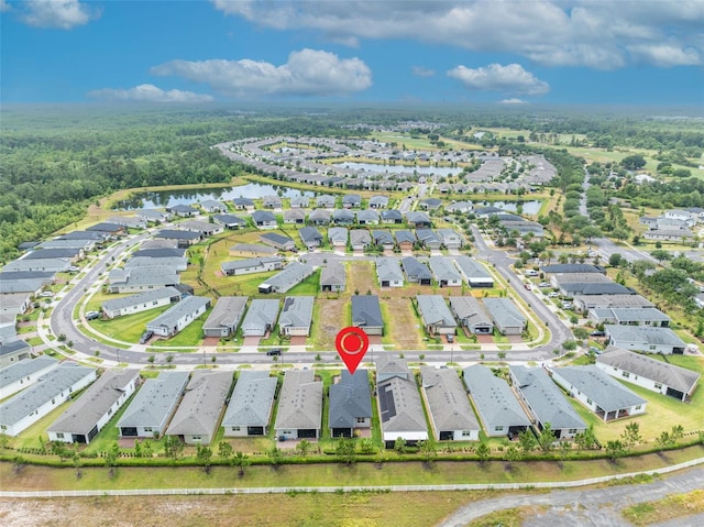 3149 Songbird Cir, Harmony, FL 34773 - aerial view of residential area featuring a nearby body of water
