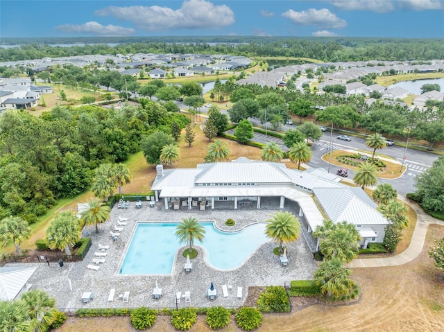 3149 Songbird Cir, Harmony, FL 34773 - aerial perspective of suburban area with a pool