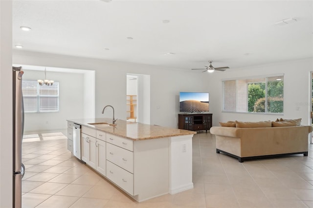 8932 SW 101st Cir, Ocala, FL 34481 - kitchen featuring a sink, light tile patterned floors, a ceiling fan, white cabinetry, and recessed lighting