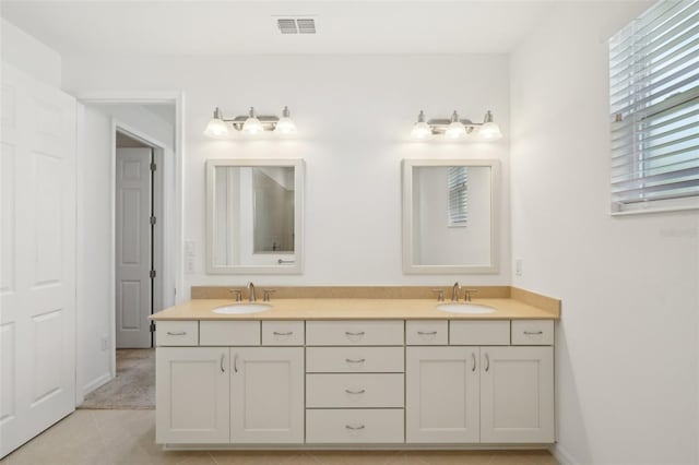 8932 SW 101st Cir, Ocala, FL 34481 - bathroom featuring tile patterned floors and double vanity