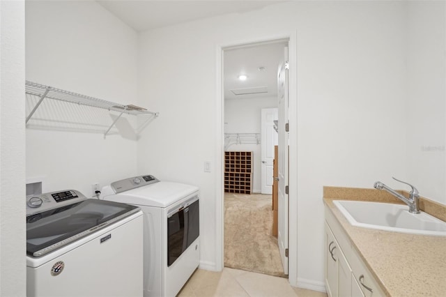 8932 SW 101st Cir, Ocala, FL 34481 - laundry room featuring washing machine and dryer, cabinet space, light tile patterned floors, and light colored carpet