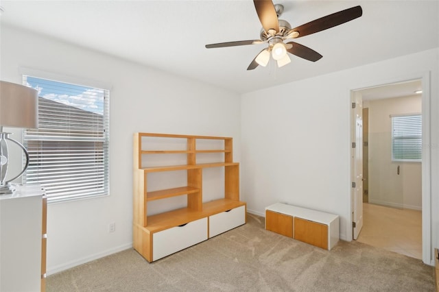 8932 SW 101st Cir, Ocala, FL 34481 - unfurnished bedroom with light carpet and a ceiling fan
