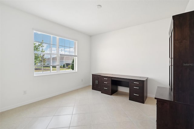 8932 SW 101st Cir, Ocala, FL 34481 - unfurnished office featuring baseboards and light tile patterned flooring