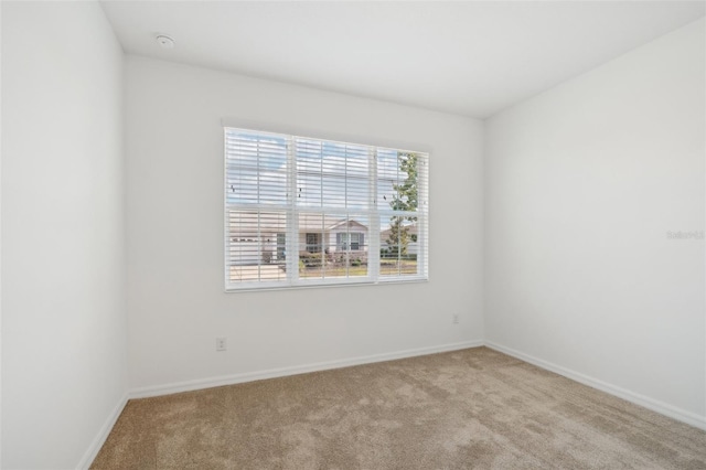 8932 SW 101st Cir, Ocala, FL 34481 - unfurnished room with carpet, baseboards, and a smoke detector