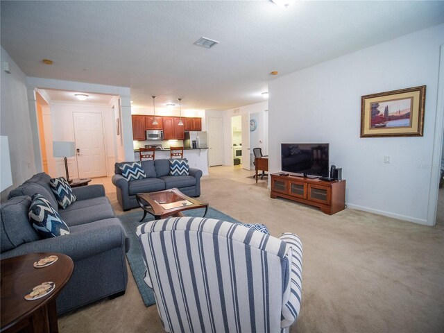4816 Cayview Ave Unit 20111, Orlando, FL 32819 - living area featuring light colored carpet and baseboards