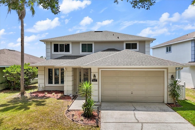 8522 Blue Horizon Ct, Kissimmee, FL 34747 - view of front facade featuring an attached garage, stucco siding, driveway, and a front lawn