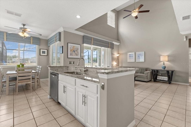 8522 Blue Horizon Ct, Kissimmee, FL 34747 - kitchen featuring ceiling fan, a sink, light tile patterned floors, open floor plan, and ornamental molding