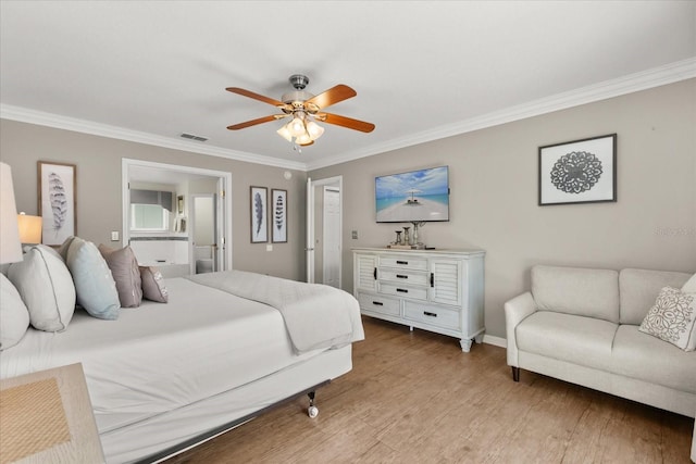 8522 Blue Horizon Ct, Kissimmee, FL 34747 - bedroom with ornamental molding, light wood-type flooring, baseboards, ceiling fan, and ensuite bathroom