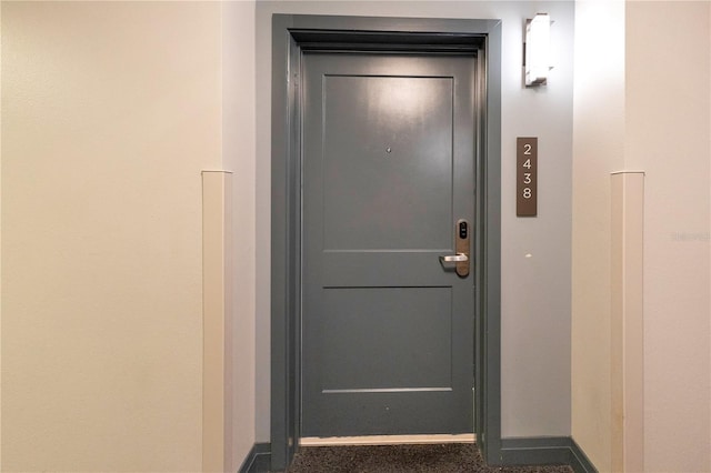 view of exterior entry featuring elevator