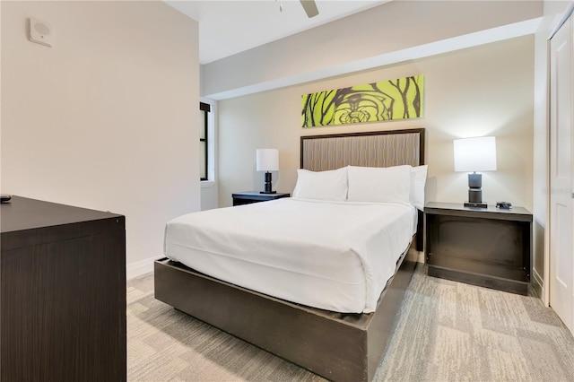 bedroom with baseboards and ceiling fan