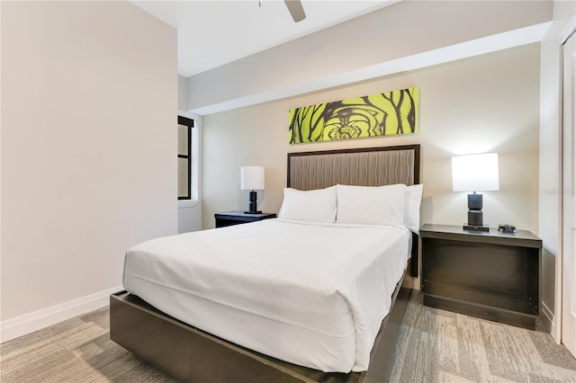 bedroom with baseboards and ceiling fan