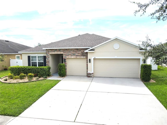 318 Briarbrook Ln, Haines City, FL 33844 - single story home with an attached garage, stucco siding, stone siding, and driveway