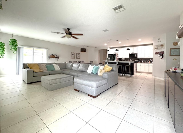318 Briarbrook Ln, Haines City, FL 33844 - living area with light tile patterned flooring, a ceiling fan, and recessed lighting