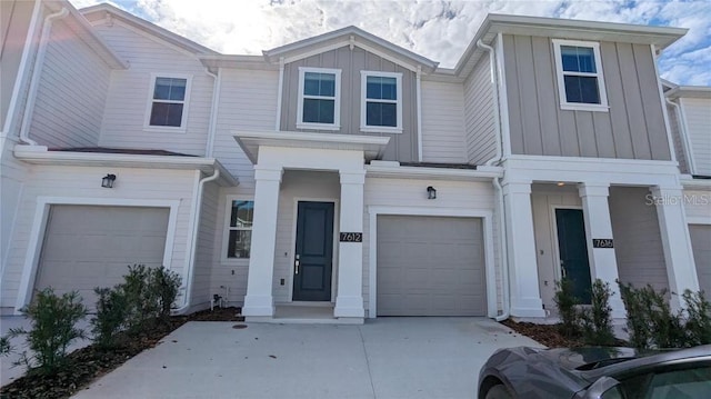 7612 Danube Rd, Kissimmee, FL 34746 - multi unit property featuring a garage and board and batten siding