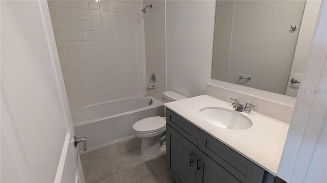 7612 Danube Rd, Kissimmee, FL 34746 - bathroom featuring toilet,  shower combination, tile patterned floors, and vanity