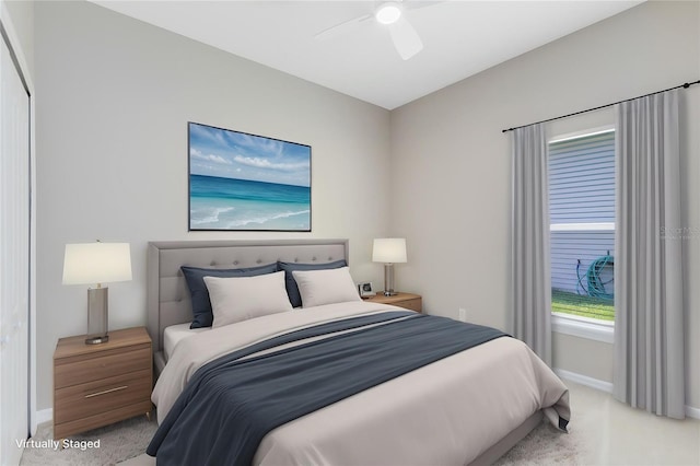 516 Brett Ct, Orlando, FL 32828 - bedroom with light carpet, baseboards, and a ceiling fan