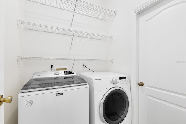 516 Brett Ct, Orlando, FL 32828 - washroom featuring washing machine and dryer