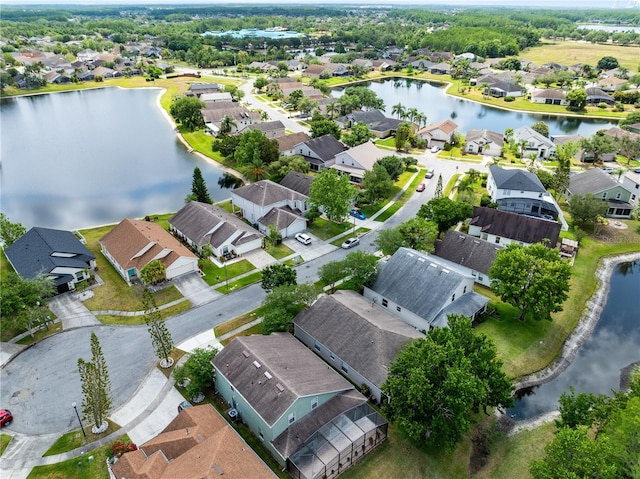 516 Brett Ct, Orlando, FL 32828 - aerial view of residential area with a large body of water
