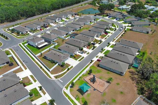 view of property location featuring nearby suburban area and a nearby body of water