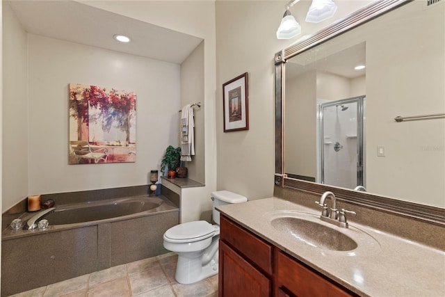 7628 Bay Port Rd Unit 43, Orlando, FL 32819 - full bathroom with a shower stall, toilet, vanity, a garden tub, and recessed lighting