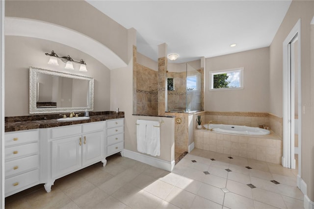 5025 Down Point Ln, Windermere, FL 34786 - full bathroom featuring walk in shower, a bath, tile patterned floors, vanity, and recessed lighting