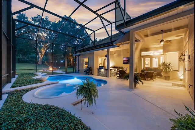 5025 Down Point Ln, Windermere, FL 34786 - view of swimming pool with a ceiling fan, a patio, an outdoor hangout area, glass enclosure, and a pool with connected hot tub
