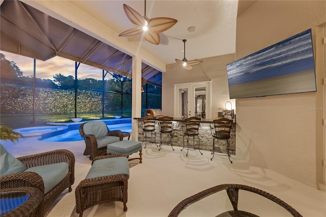 5025 Down Point Ln, Windermere, FL 34786 - sunroom featuring a swimming pool, ceiling fan, and french doors