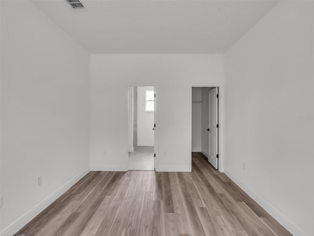 2071 W Doral Ct, Citrus Springs, FL 34434 - spare room with wood finished floors and baseboards