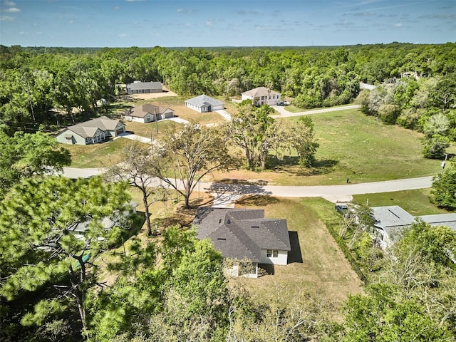2071 W Doral Ct, Citrus Springs, FL 34434 - aerial perspective of suburban area featuring a forest