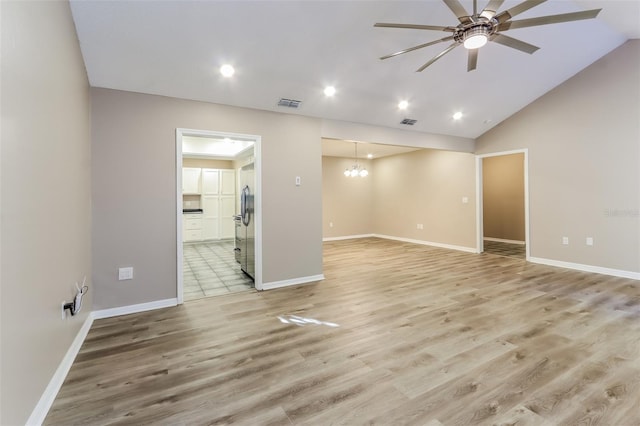 4265 Old Colony Rd, Mulberry, FL 33860 - empty room with ceiling fan, baseboards, light wood-style floors, a chandelier, and recessed lighting