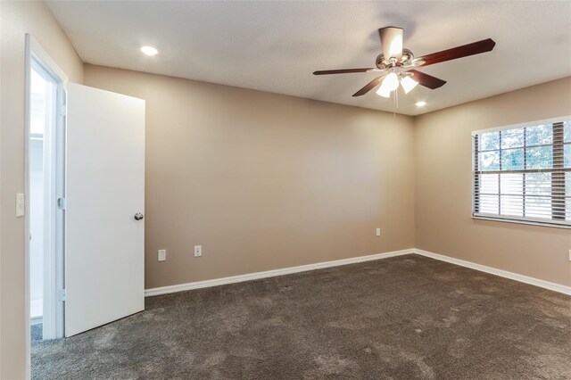 4265 Old Colony Rd, Mulberry, FL 33860 - spare room featuring dark colored carpet, a ceiling fan, recessed lighting, and baseboards