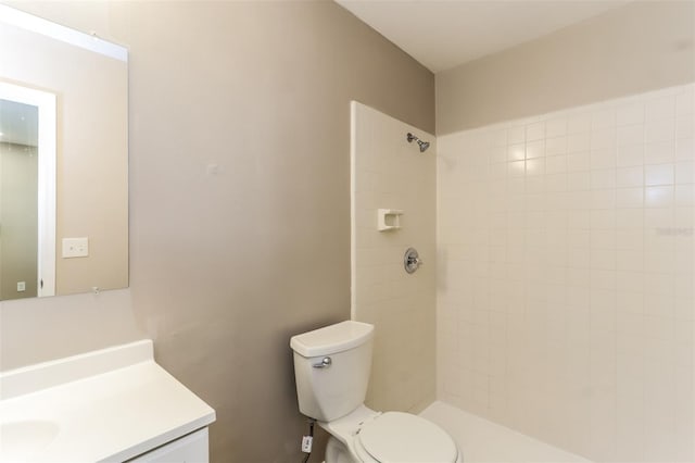 4265 Old Colony Rd, Mulberry, FL 33860 - bathroom featuring tiled shower, vanity, and toilet