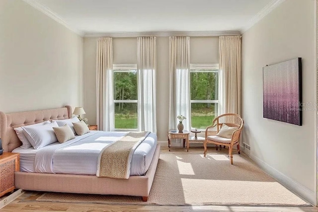 bedroom featuring crown molding