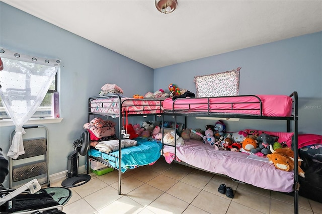 1508 Roger Babson Rd, Orlando, FL 32808 - bedroom with tile patterned floors and baseboards