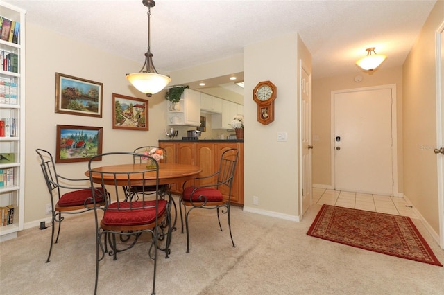 474 Windmeadows St Unit 0, Altamonte Springs, FL 32701 - dining area featuring light carpet, baseboards, and recessed lighting