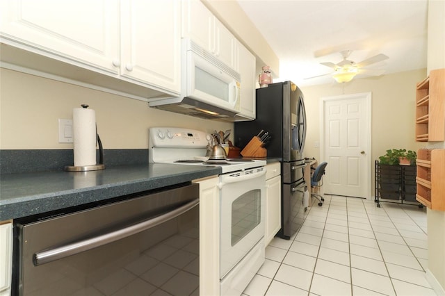 474 Windmeadows St Unit 0, Altamonte Springs, FL 32701 - kitchen with white appliances, light tile patterned flooring, dark countertops, white cabinetry, and ceiling fan