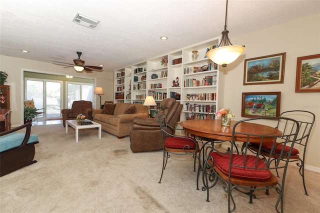 474 Windmeadows St Unit 0, Altamonte Springs, FL 32701 - dining area featuring carpet floors, a ceiling fan, a textured ceiling, and recessed lighting
