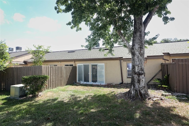 474 Windmeadows St Unit 0, Altamonte Springs, FL 32701 - rear view of house featuring stucco siding and roof with shingles