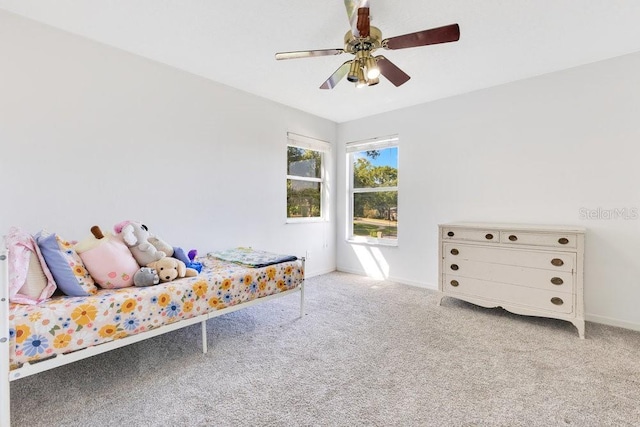 1837 Sweetwater W Cir, Apopka, FL 32712 - carpeted bedroom with baseboards and ceiling fan