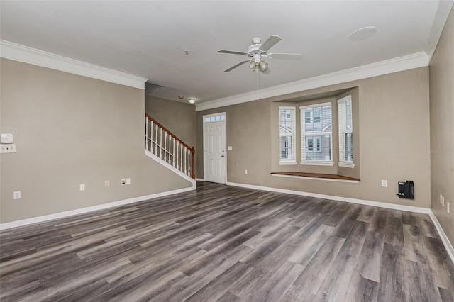 6611 Time Square Ave Unit 103, Orlando, FL 32835 - unfurnished living room with ornamental molding, ceiling fan, baseboards, dark wood-style floors, and stairs
