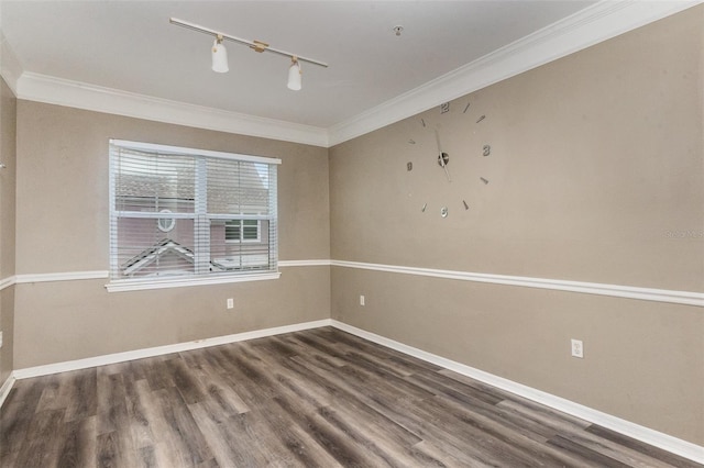 6611 Time Square Ave Unit 103, Orlando, FL 32835 - spare room with ornamental molding, wood finished floors, baseboards, and track lighting